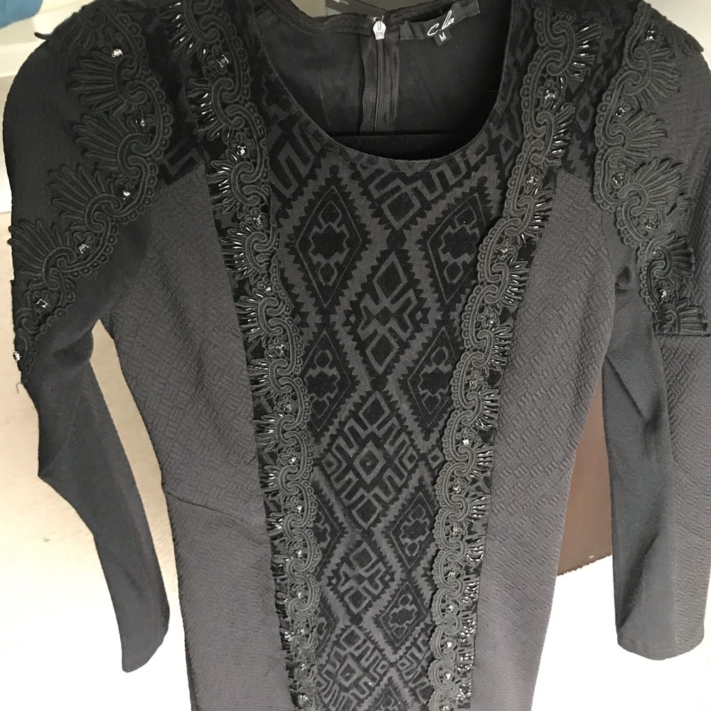 Black fitted dress with detail SIZE MEDIUM